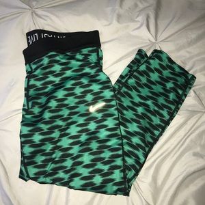 green and black nike running tights